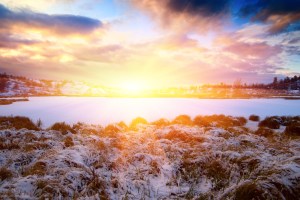 bigstock-winter-north-lake-and-sunset-12746807