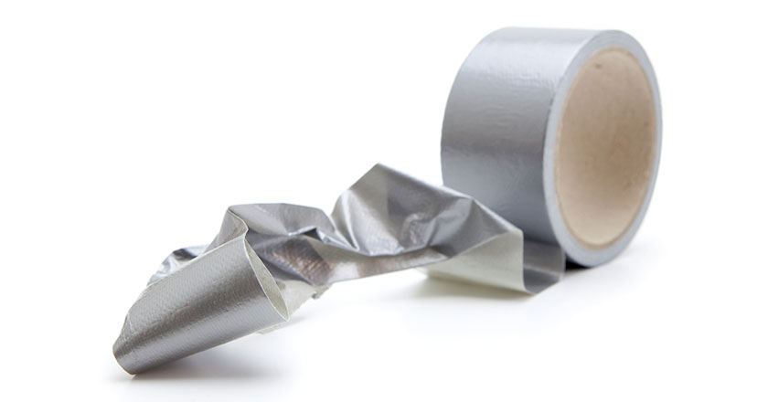 Duct tape unrolled on white background