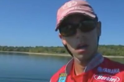 Mike Iaconelli Leaps from Boat to Land a Bass - Wide Open Spaces