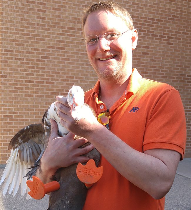 Jiskie Poses with Philip who is sporting his new 3D printed feet. Photo Credit: Jason Jiskie