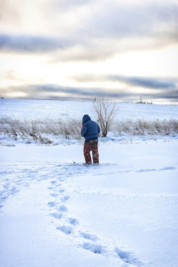 Men's winter fun hike to the pond on the ice-fishing