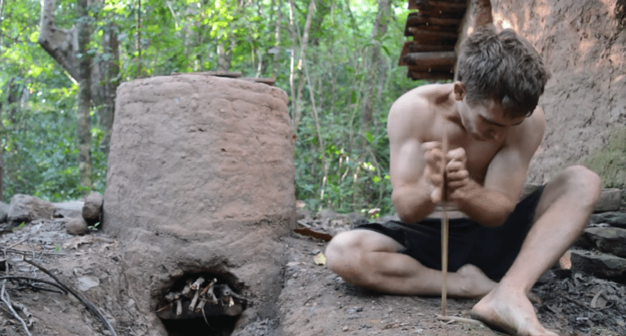Primitive Technology: Using Termite Mound Clay to Make a Kiln and ...