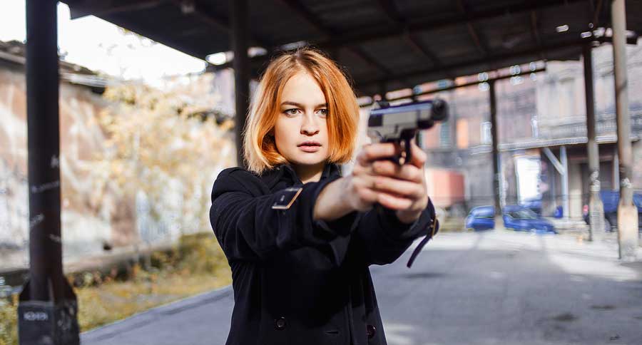 woman with handgun