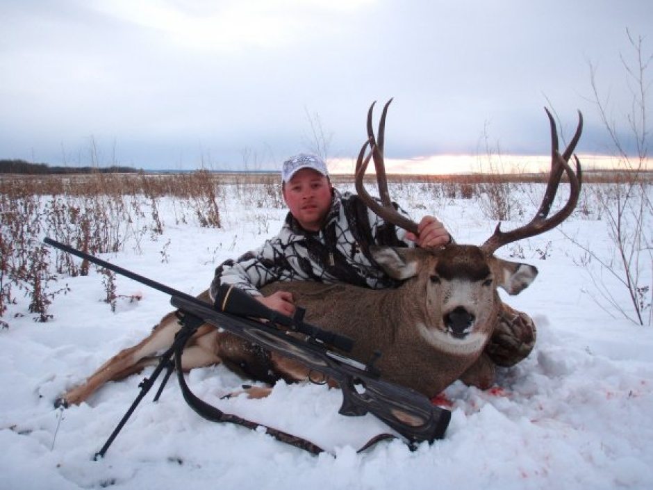 David with an Alberta mule deer in 2010.