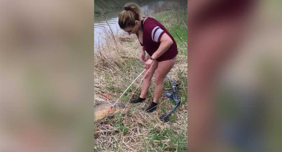 girl in socks bowfishing