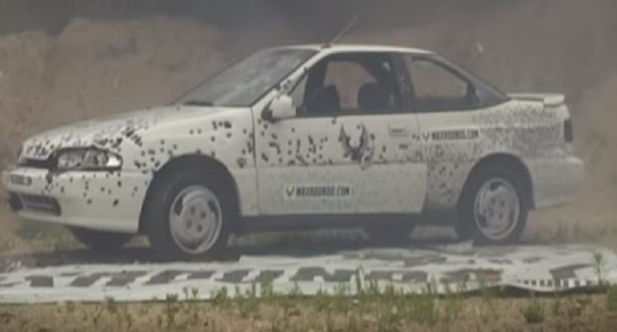 saiga 12 shotguns vs. car