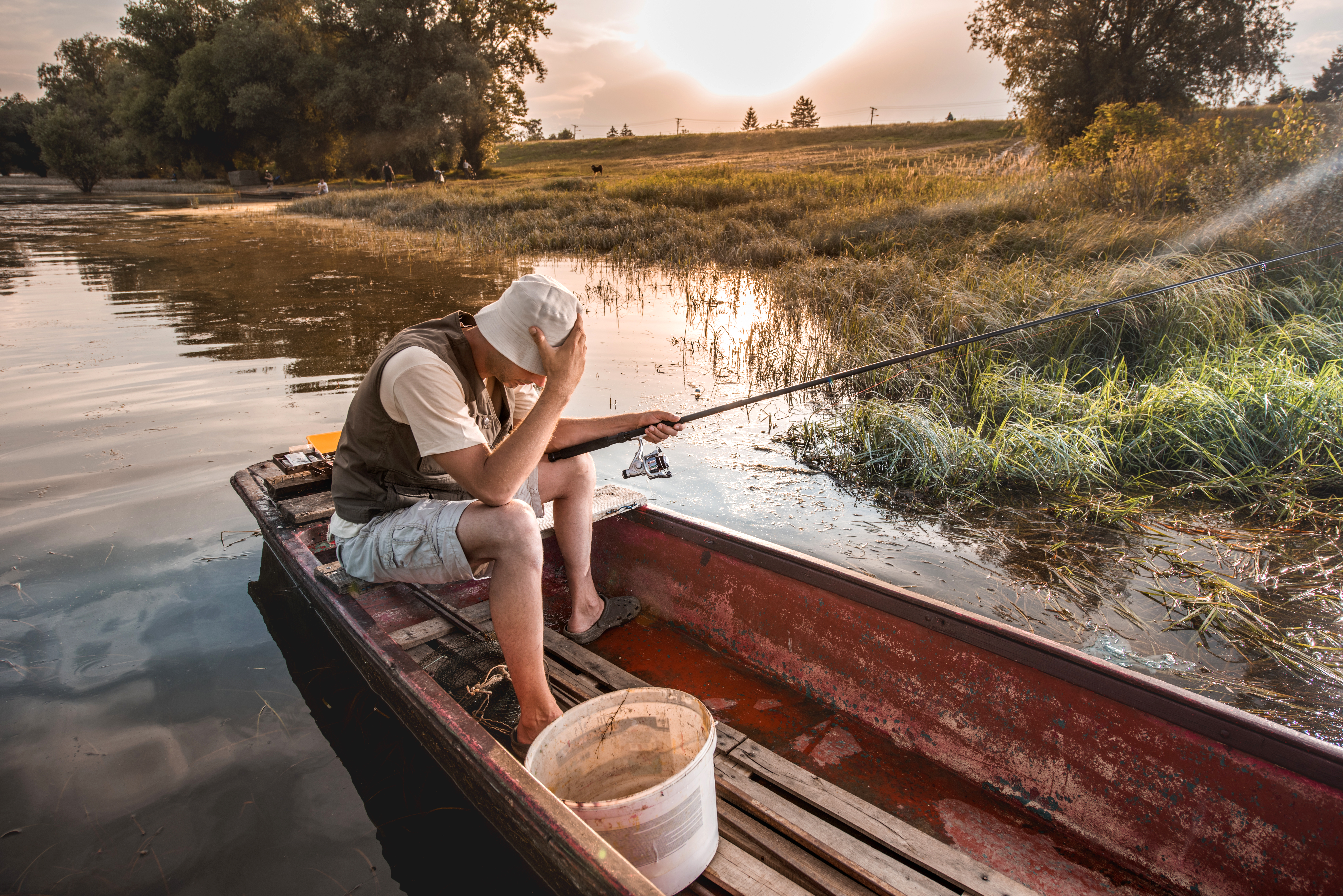 Displeased man didn't catch a fish on fishing.