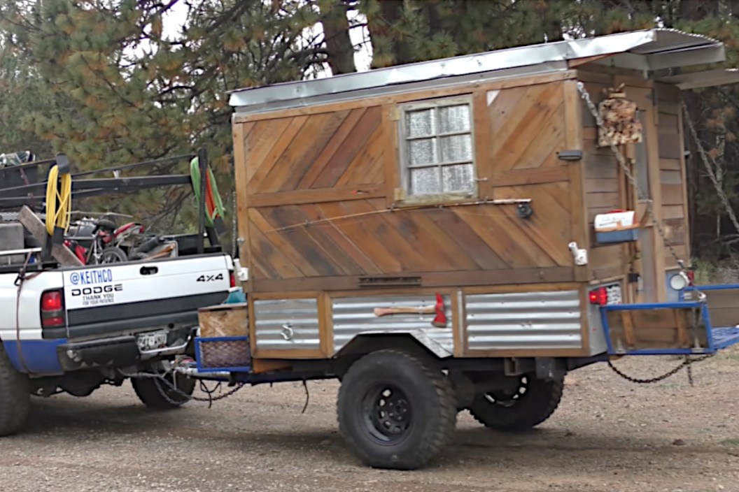 Construction Worker Lives Off-Grid in Tiny Homemade Camper for Four ...