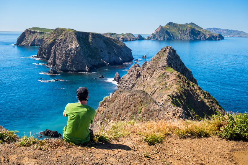 Traveller resting at breathtaking landscape on Anacapa Island. Anacapa Island is one of the five islands which form the Channel Islands National Park, near Los Angeles, California, USA