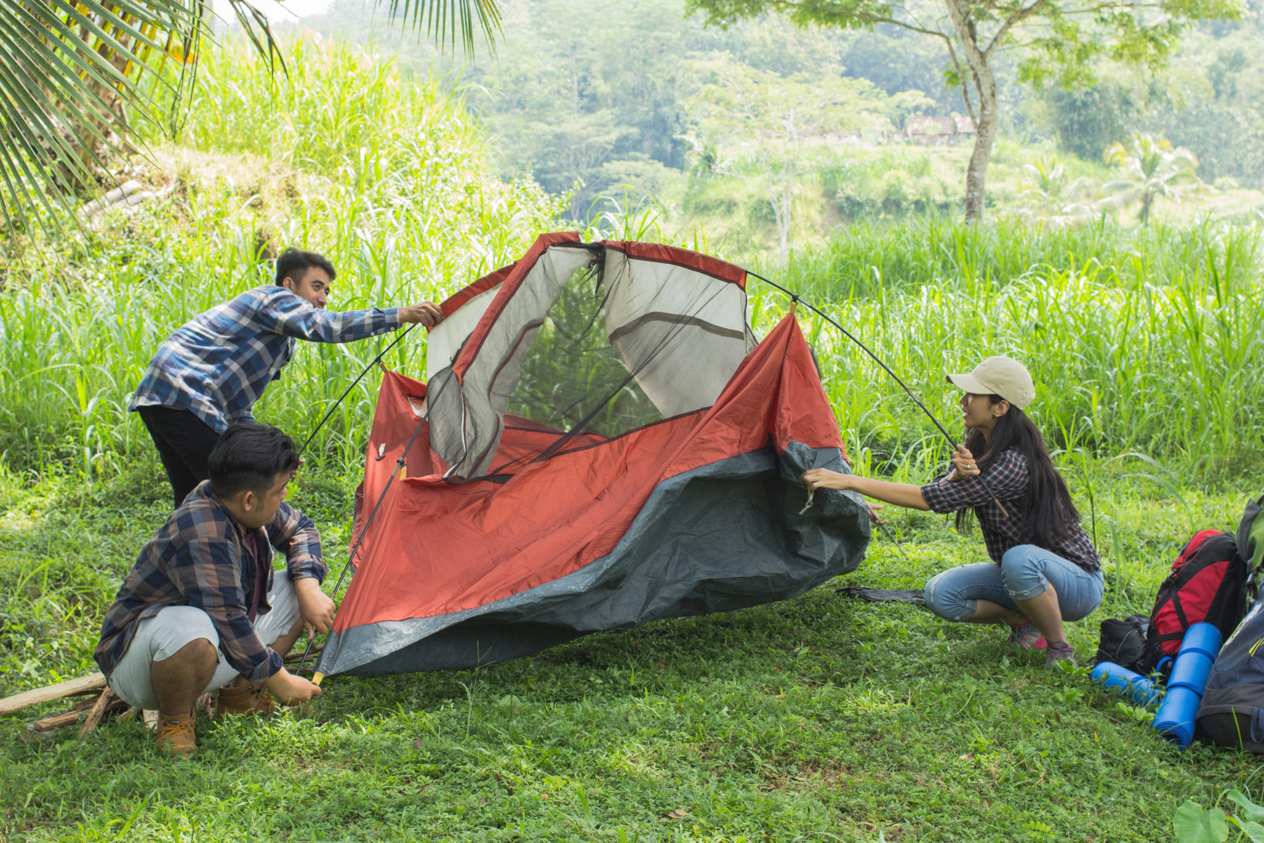 attach poles to tent