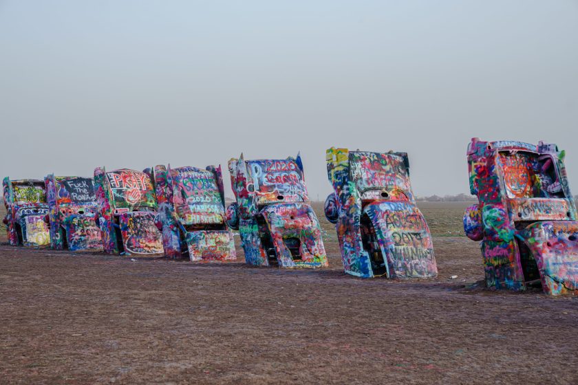 AMARILLO, TEXAS - DECEMBER 23: Cadillac Ranch, a public art installation and sculpture created in 1974 by Chip Lord, Hudson Marquez and Doug Michels on December 22, 2020 in Amarillo, Texas