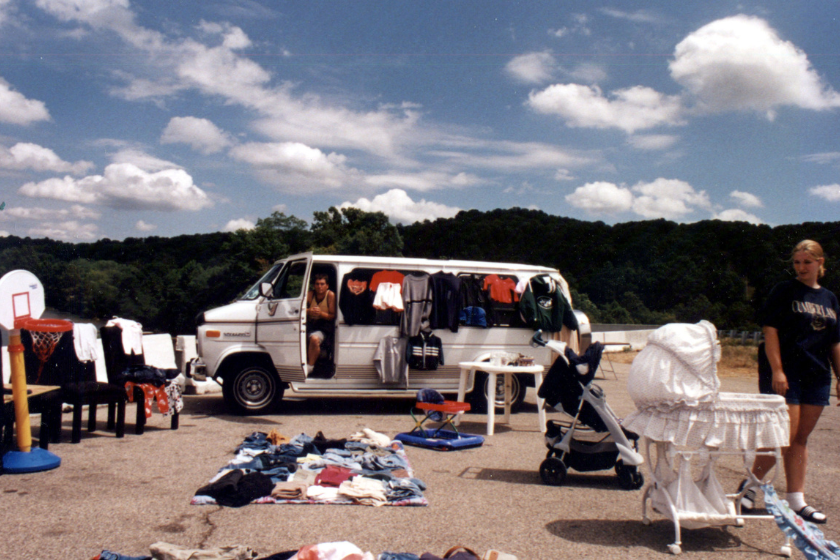 This van serves as home and store to a vendor who is selling everything from plastic basketball hoops to sweaters along Hwy. 127