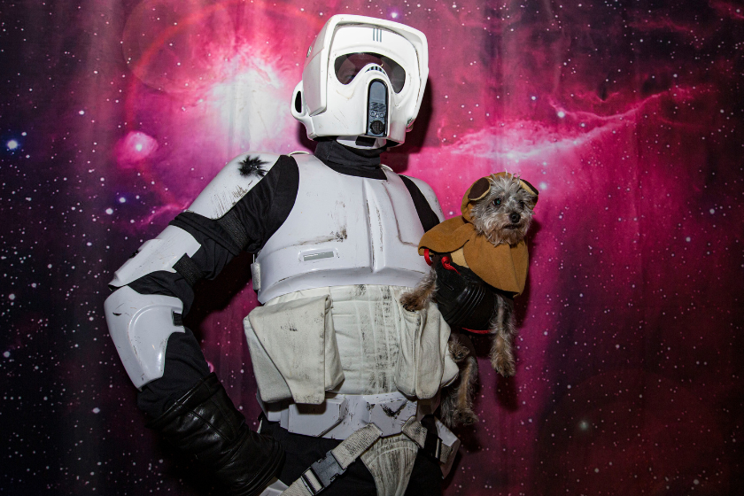 an Diego resident Todd Felton and his dog Georgie appear in cosplay as a Stormtrooper and an Ewok at Comic-Con Museum 