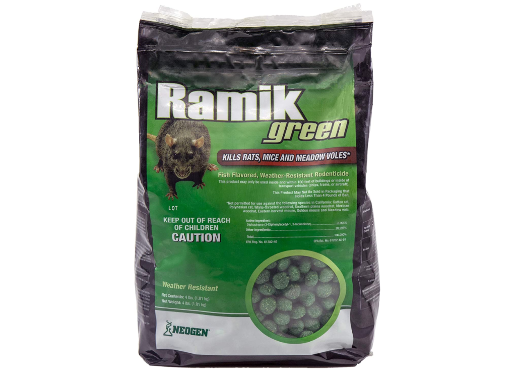 A large green bag filled with rat posion
