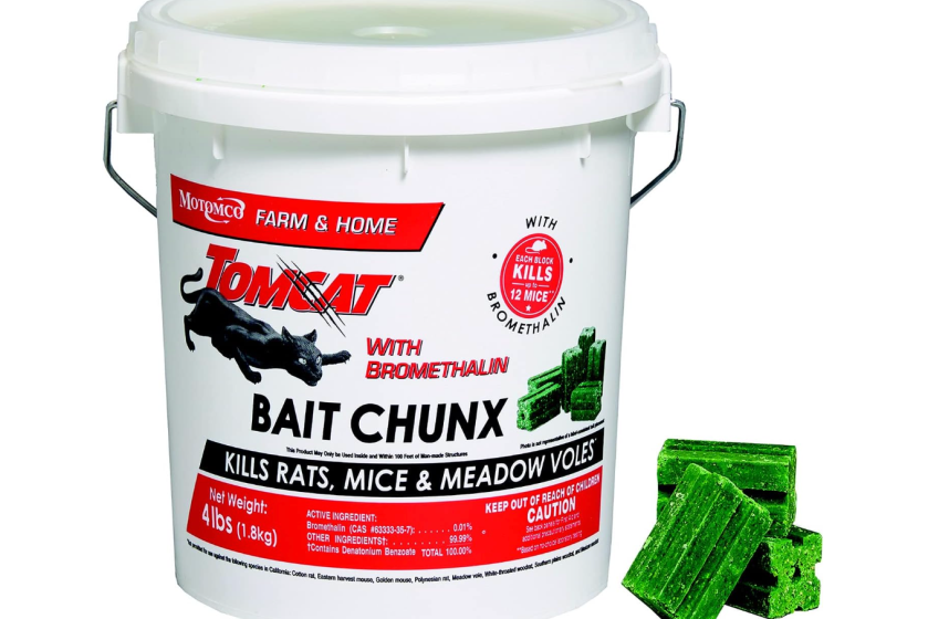 A white plastic container of Tomcat Bait Chunx