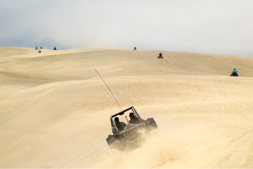 Off road vehicles at Pismo Beach Dunes.