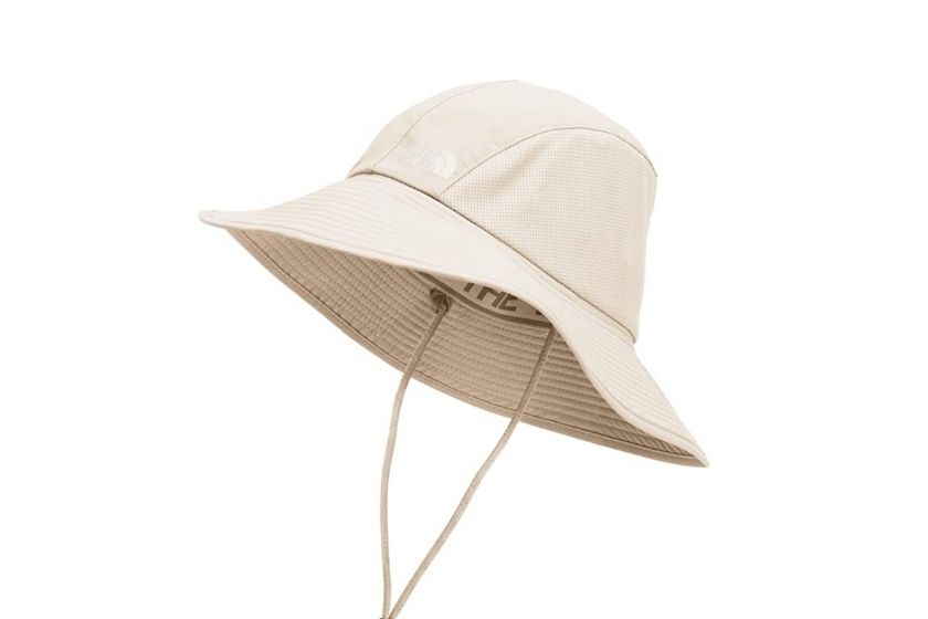 hiking hat, bucket hat in shade beige with adjustable drawstring for a secure fit