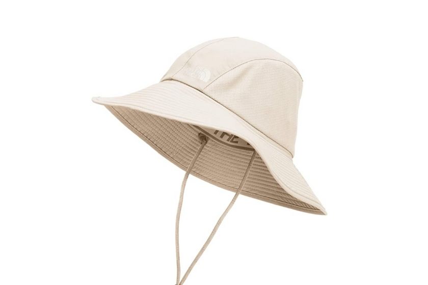 hiking hat, bucket hat in shade beige with adjustable drawstring for a secure fit