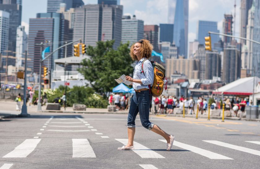 woman tourist holding a map in New York