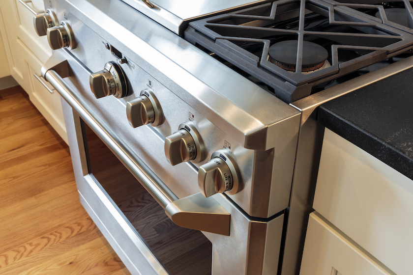 Close up stainless steel stove with oven, professional grade - squirrel recipes