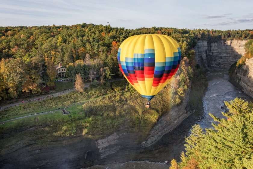 Hot Air Balloon Flying Over Letchworth State Park In New York
