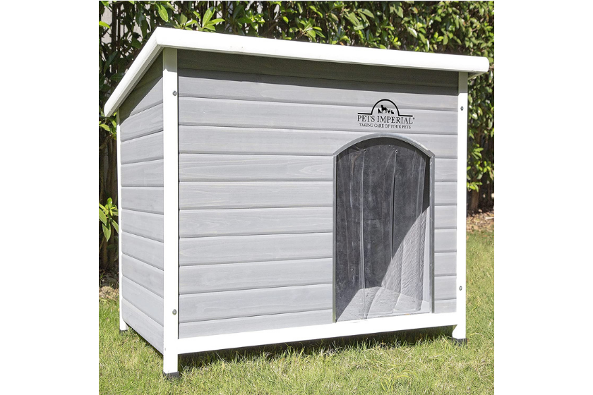 insulated wooden dog house with plastic flap