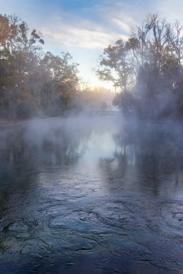 Evaporation from Natural Springs on Cold Morning in Florida State Parks during Sunrises