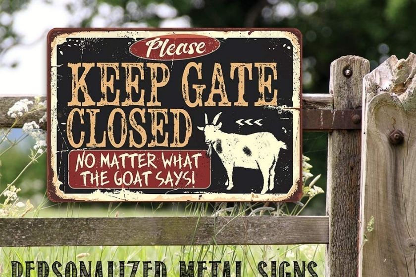 funny goat sign keep gate closed