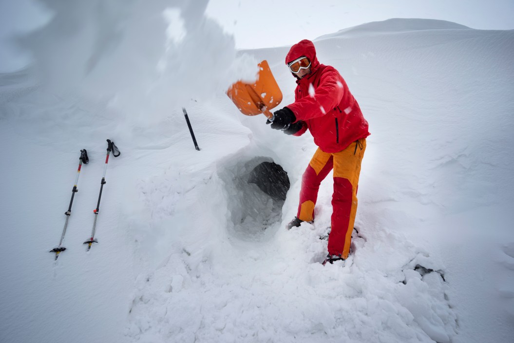 winter survival digging a snow cave