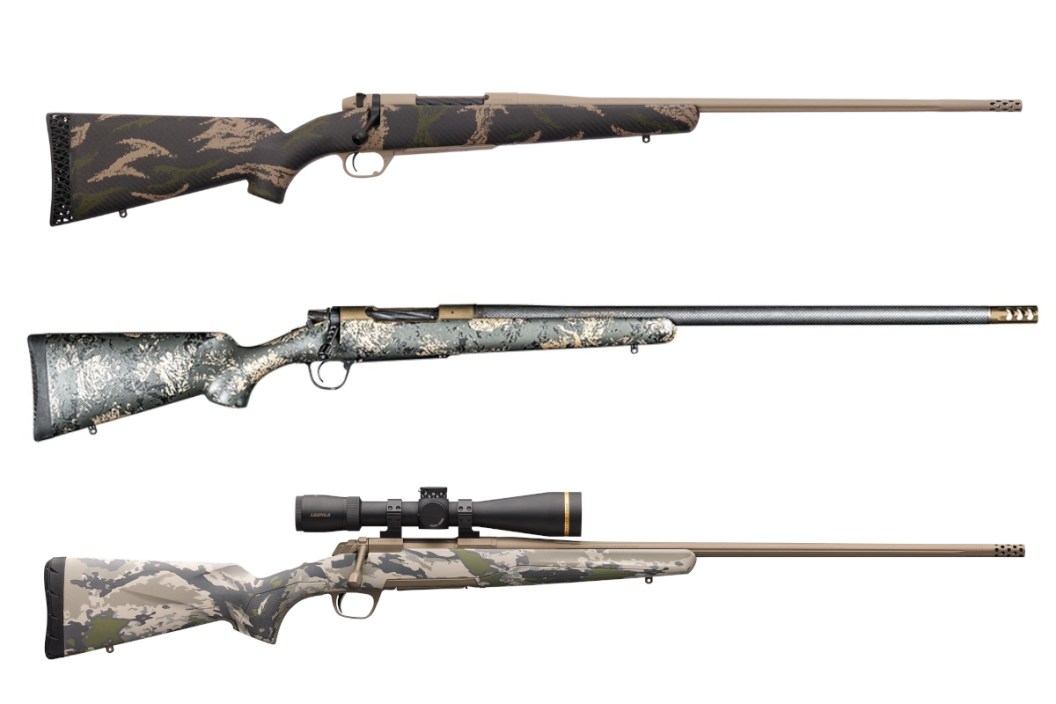 Three rifles chambered for 280 Ackley Improved