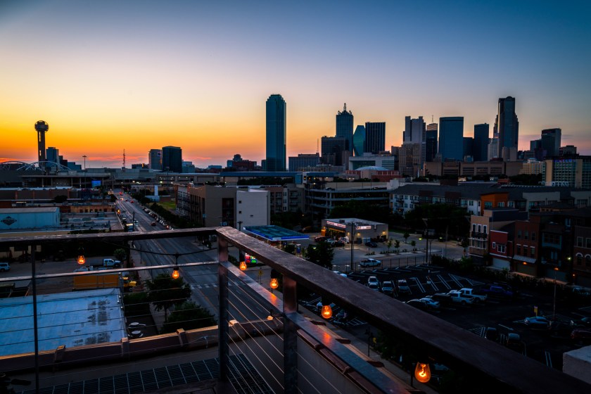 Aerial drone view Blue hour downtown Party lights glow with illuminated Dallas Texas Skyline Cityscape