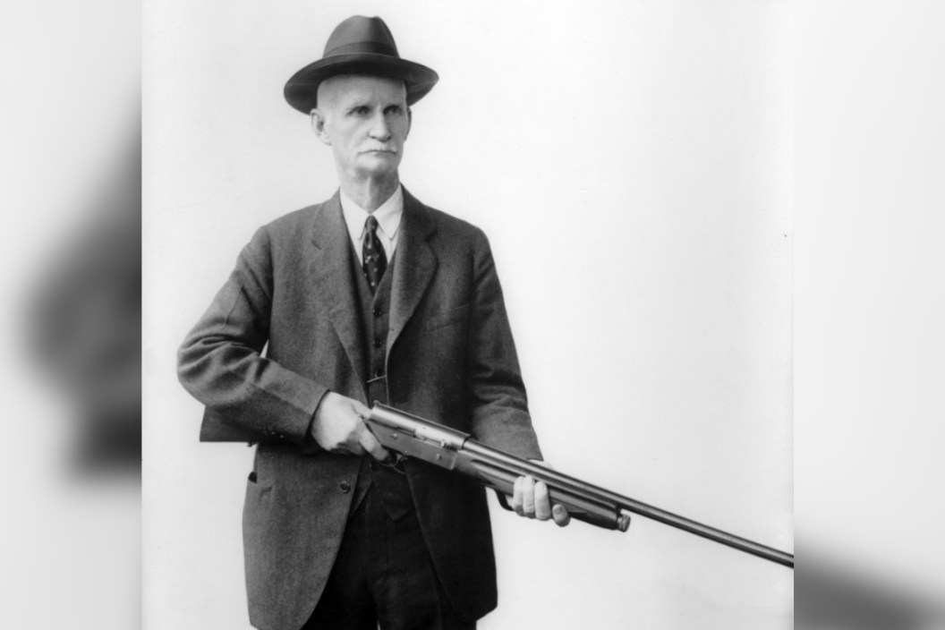 John Browning with his A5 semi-automatic shotgun.