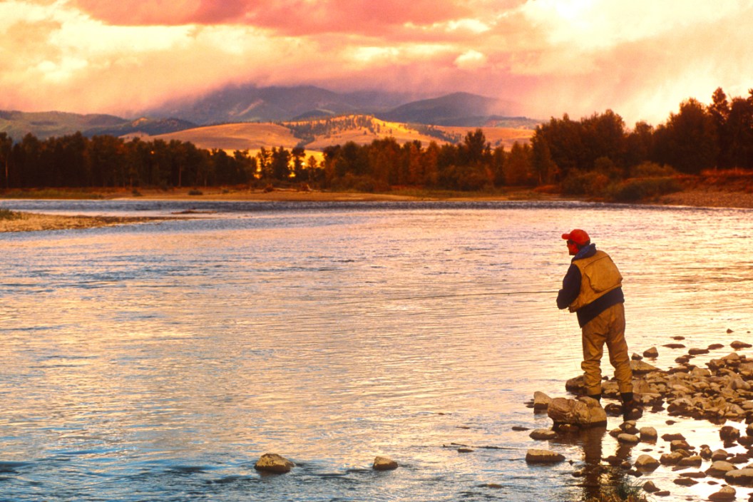 Fly fisherman on a river in Montana.