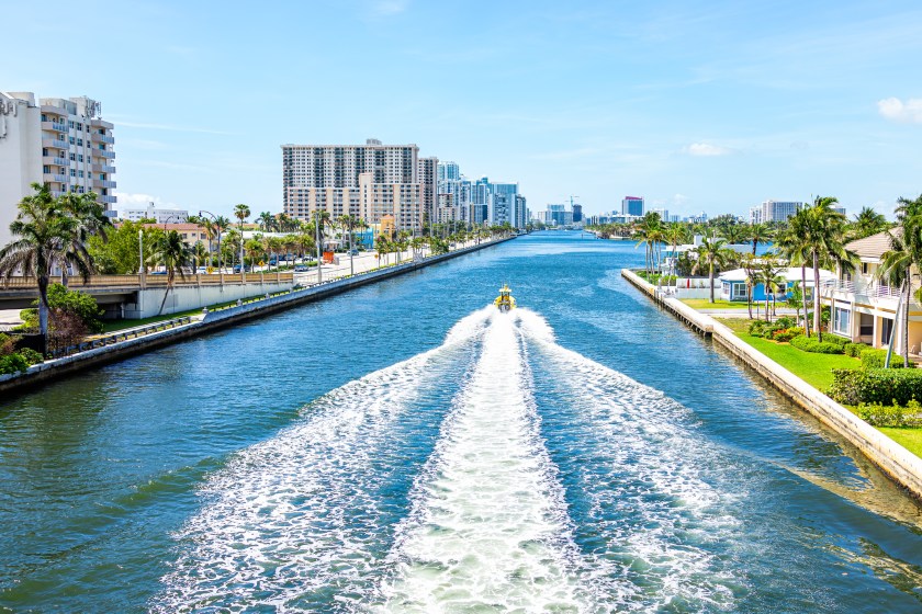 Hollywood, Florida in Miami beach area with cityscape of residential skyscrapers coastal buildings and above aerial view of bay Stranahan River