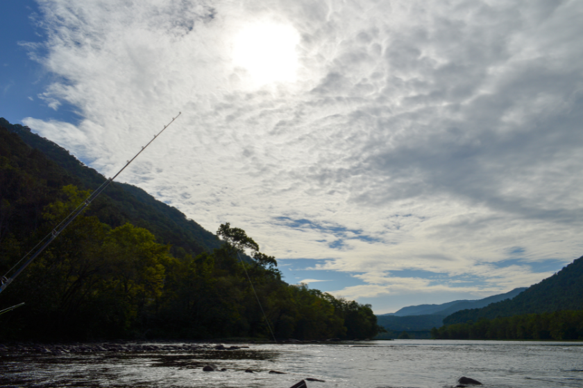 A fishermans pole hanging over a section of the New River in Raleigh County, West Virginia