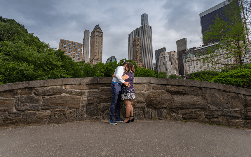 Young Man And Woman Romantic Couple Hug and Kiss In Central Park, New York City
