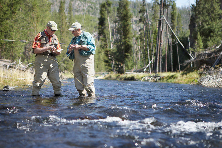 Two anglers fly fishing in Montana