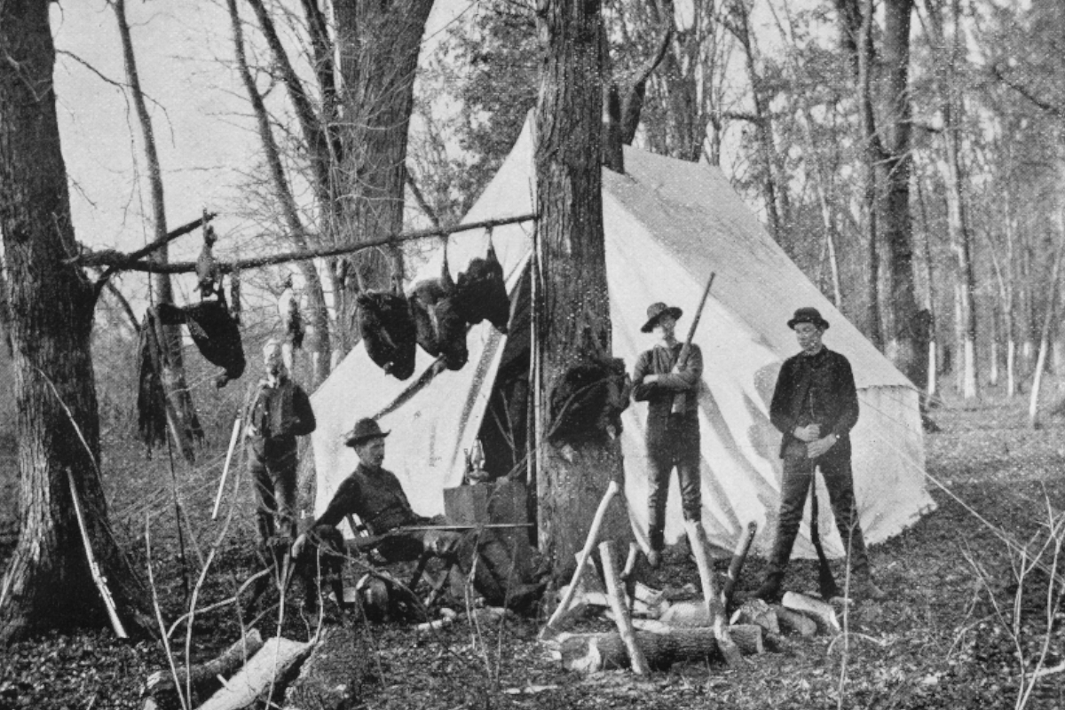 A group of hunters with their turkeys.