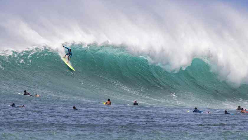 US surfer John John Florence rides the waves at Sunset beach on the North shore of Oahu, Hawaii on May 1, 2021