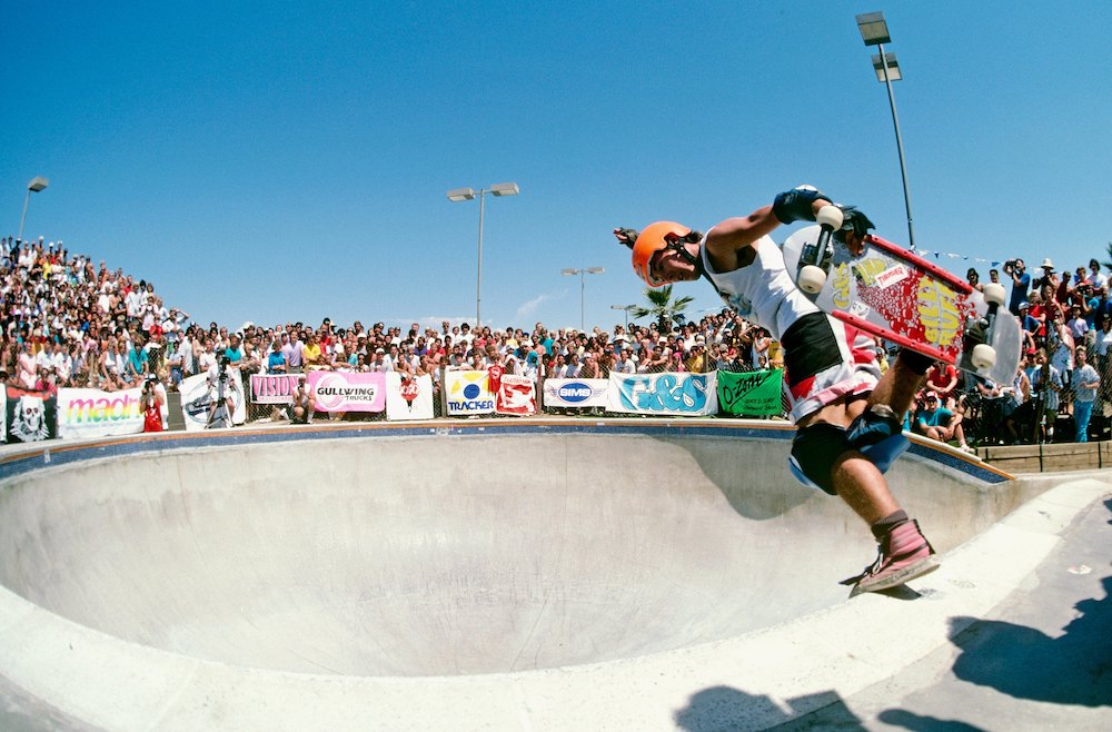 Billy Ruff, riding for Gordan and Smith Skateboards, does a backside boneless in the keyhole pool during competition at the National Skateboarding Association event at the Del Mar Skate Ranch in August 1985 in Del Mar, California.