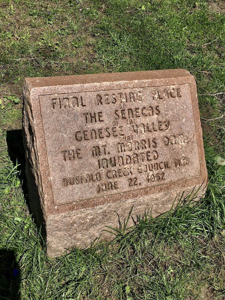 Memorial marking the burial site of the Seneca of the Genesee Valley, inundated by the Mount Morris Dam, Seneca Indian Park, Buffalo, New York, May 2020.