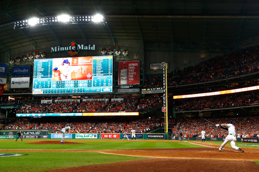 Alex Bregman #2 of the Houston Astros hits a game-winning single during the tenth inning against the Los Angeles Dodgers in game five of the 2017 World Series at Minute Maid Park on October 30, 2017 in Houston, Texas.