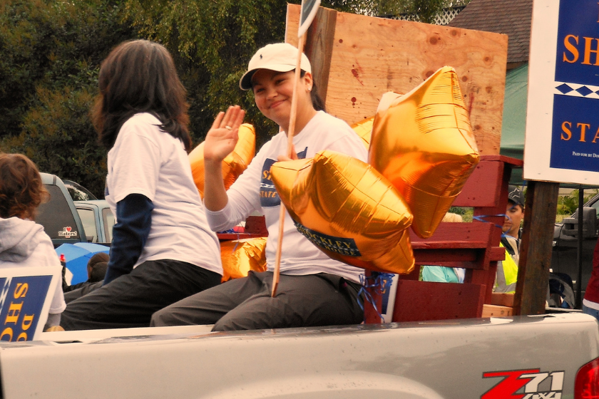 Melanie Joy Huntington, née Shockley, is an American public relations consultant, indigenous activist and politician of Koyukon) heritage. She is shown in this photo riding in the 2012 Golden Days Parade, supporting the candidacy of mother Dorothy Shockley (to her right with back to camera), who was running for the Alaska House of Representatives.