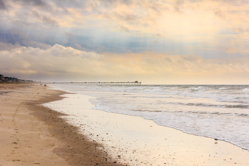 Beach and Bogue Inlet Fishing Pier at Emerald Isle, North Carolina.