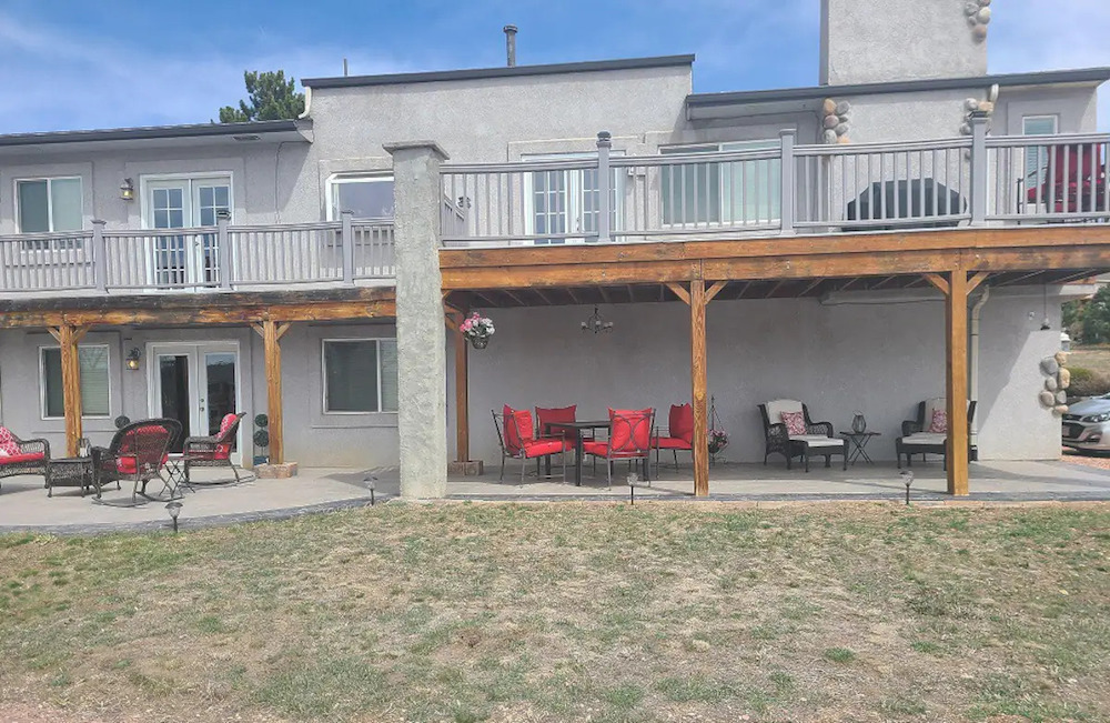 view of a home with patio furniture