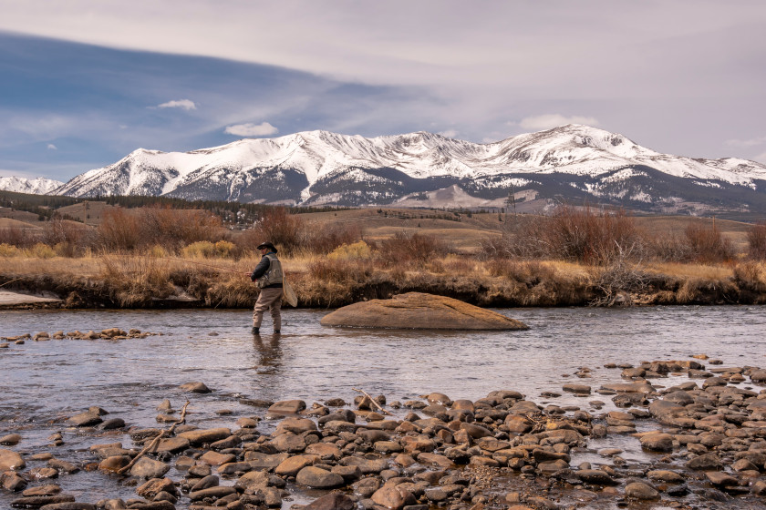 A fly angler fishing the Arkansas River in Colorado.