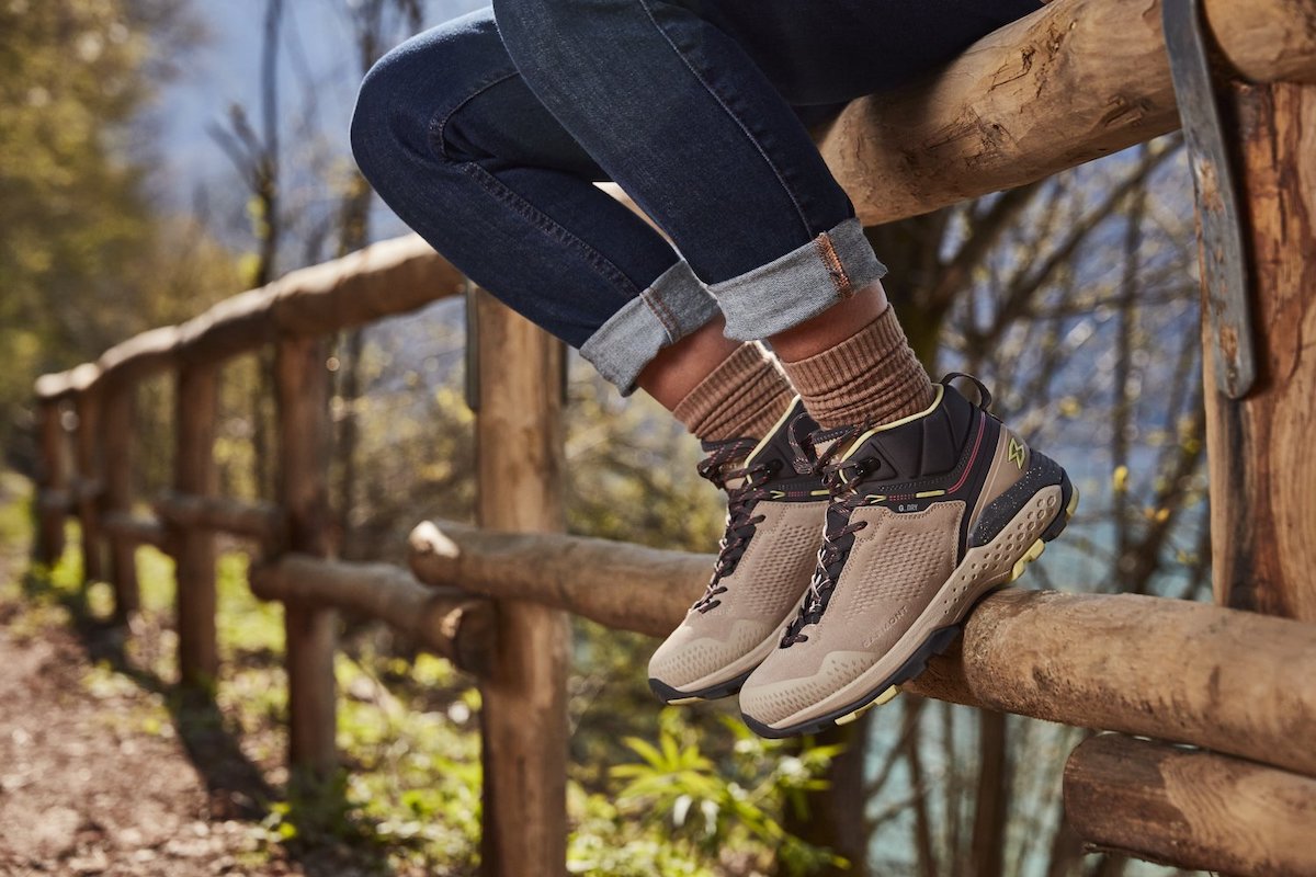 Groove Mid G-Dry hiking shoe worn by an outdoorsman in the woods.