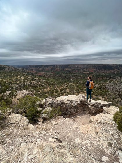 Hiker on Rylander Fortress Cliff Trail at Palo Duro Canyon State Park