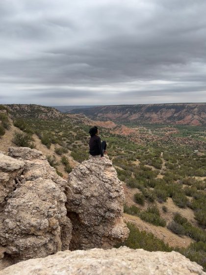 Hiker on Rylander Fortress Cliff Trail at Palo Duro Canyon State Park