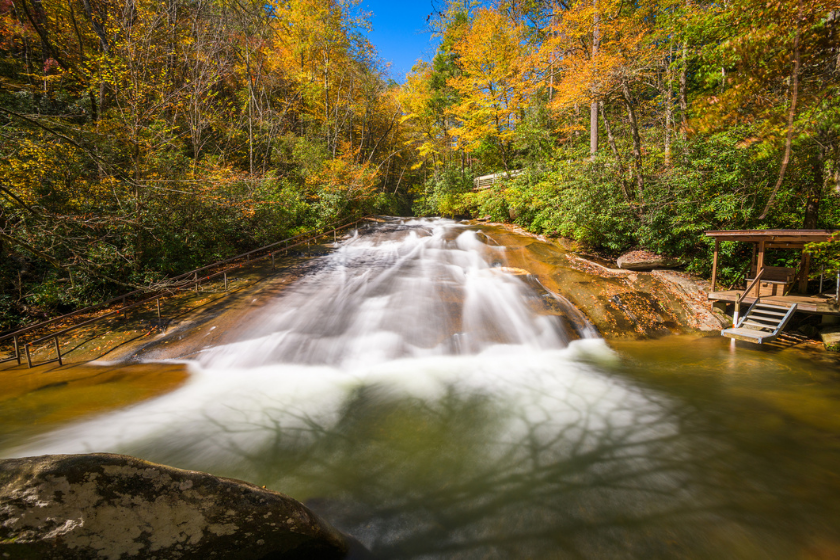 Sliding Rock Falls on Looking Glass Creek in Pisgah National Forest, North Carolina, USA in the autumn season.